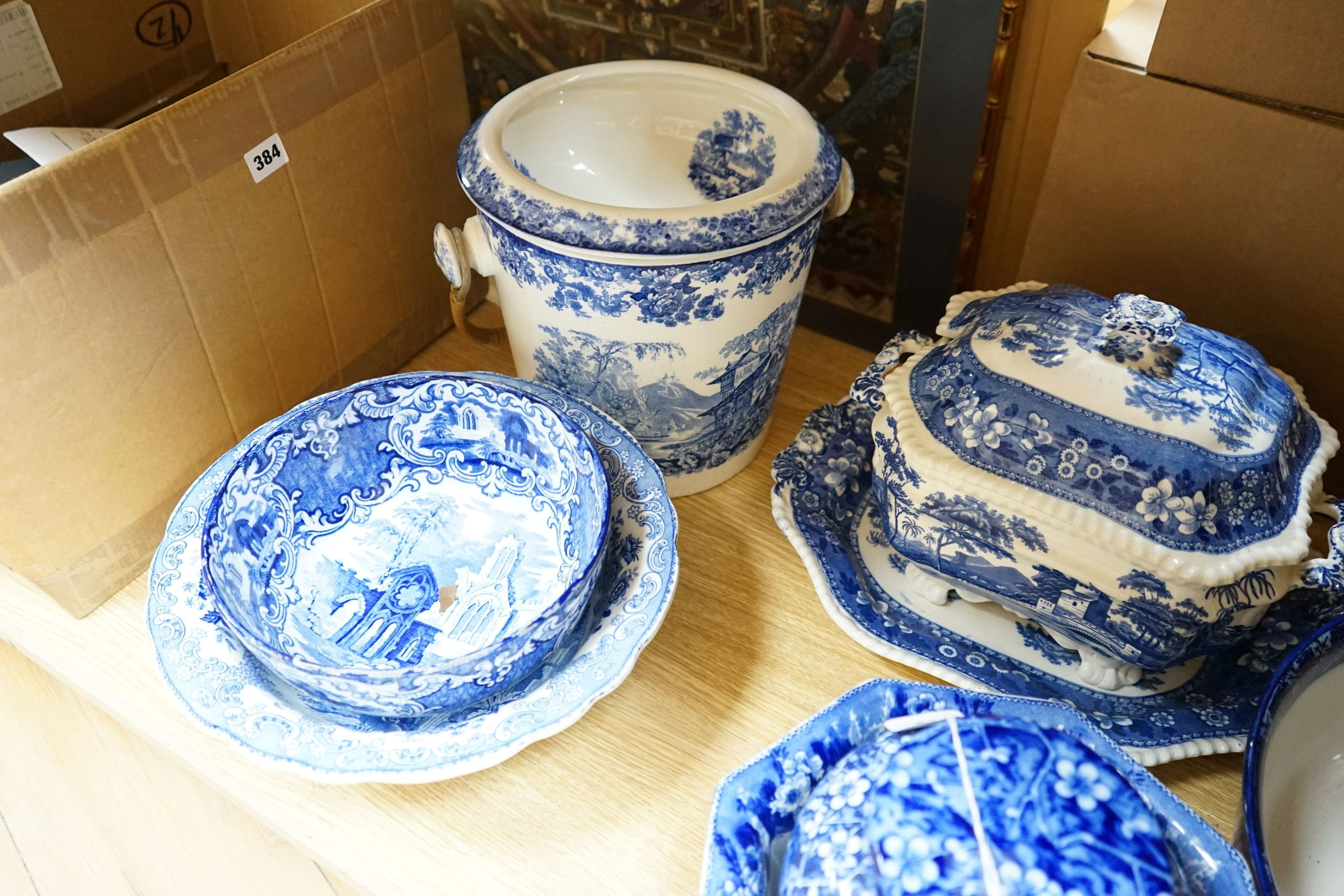 A blue and white jug and basin, tureen, cover and stand, slop pail, a jar and cover and three bowls